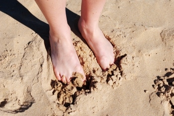 Podiatrist Feet in Sand
